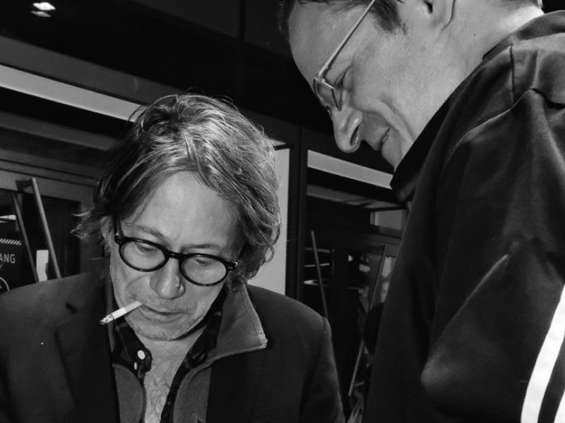 French actor and director Amalric and fan.