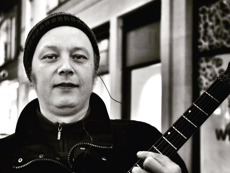 IRISH FACES. Nathe. Musician in the streets of Dublin.