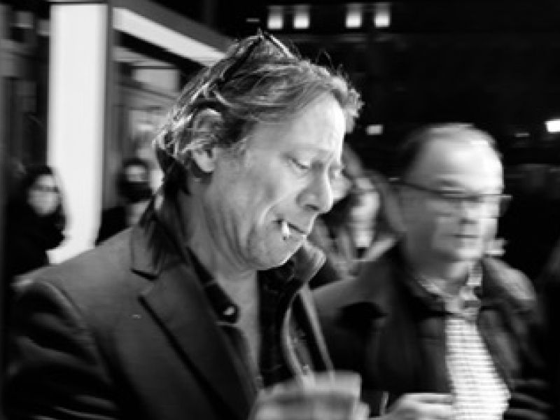 French actor Mathieu Amalric with cigarette and fans.